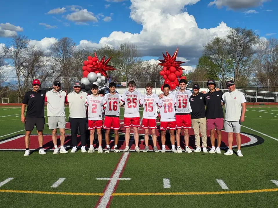 Somers Tuskers lacrosse seniors with their coaches